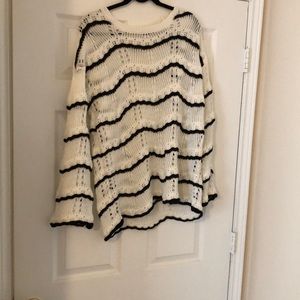 White and black sweater